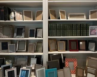 A large collection of picture frames 