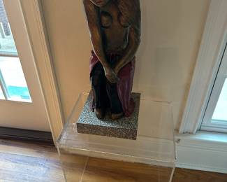 Really interesting heavy statue and  lucite pedestal 