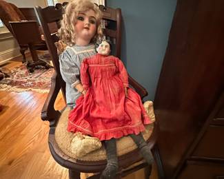 Beautiful old German doll and an English China doll original clothes