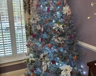 This is an original 60’s silver
Tree with pink and silver