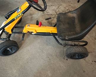 A lot of vintage toys including this go cart