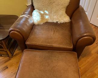 Wonderful leather chair and ottoman 
Could be cleaned but has great patina and a lot of life left