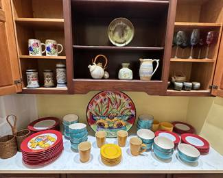 Beautiful set of dishes 
Reds and blues and yellow