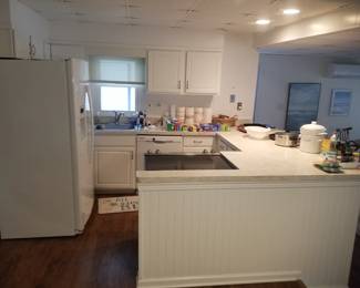 Pretty small white kitchen Kitchen is U-shaped