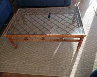 Rattan coffee table; area rug