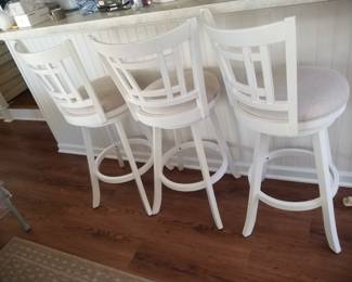 Set of three swivel bar stools