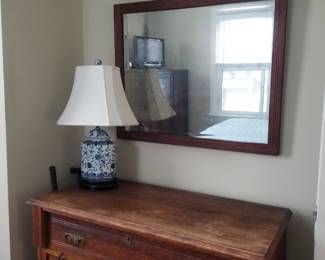 3 drawer dresser; table lamp; mirror