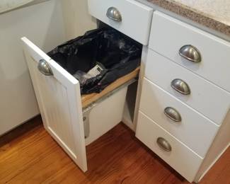 Cabinetry detail: trash corral