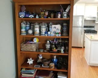 Bookcase; steins & collectibles