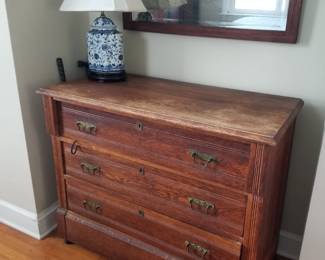3 drawer dresser; table lamp; mirror