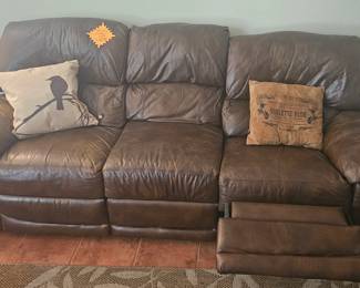 Reclining leather sofa now $97.50