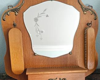 Antique hanging vanity mirror with brushes