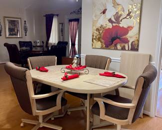 VINTAGE BLONDE DINING TABLE WITH 4 ROLLING CHAIRS-HAS A LEAF