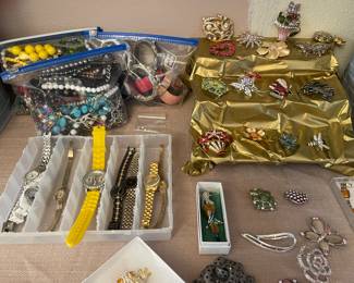 WATCHES AND BROOCHES