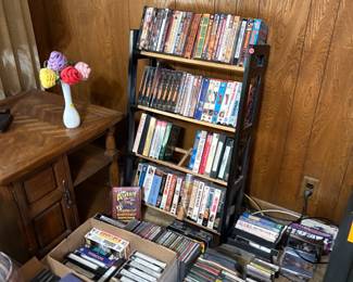 Collector Series DVDs and numerous VHS and CD tapes.