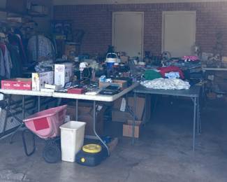 Garge full of clothes and lots more