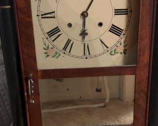 Antique American pillar and scroll mantel clock.