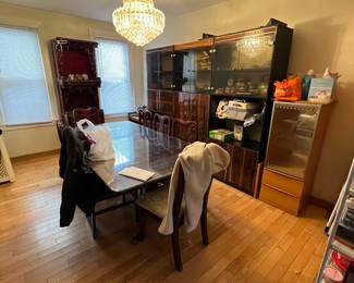 Dining table and chairs. Display cabinets