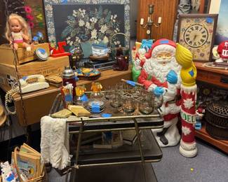 Santa blow mold 
Vintage metal tray table
Mcm glass w stand 
Vintage phone very 60’s & 70’s room 