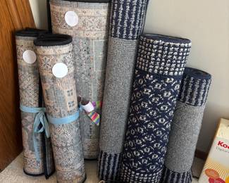 Several Area Rugs and Runners