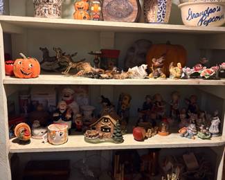 Vintage Halloween decorations and faux flower arrangements.