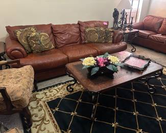 Leather sofa, copper top coffee table