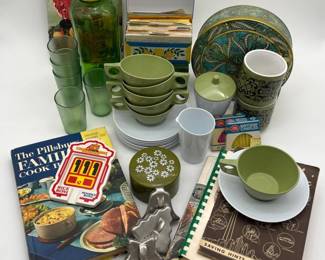 132 VintageKitchenLotFeaturingMelamineCupswithSaucersandCookbooks