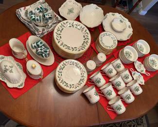 Lennox Christmas dishes, additional pieces in following photos this photo Includes set for 12 dinner plates, salad/dessert plates, small plates, bowls, mugs, cream, and sugar covered butter, gravy, etc.