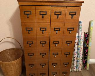 CD or DVD holder cabinet shown closed Looks like old apothecary cabinet.