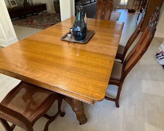 Dining table and six chairs available.
