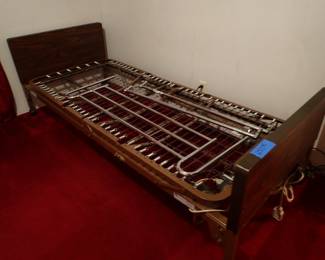 Two Hospital Beds Adjustable.