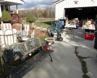 Bench. Bird Baths. Hose Reel. Bicycles.