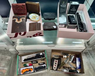 Wallets, Gun Holsters, Mini Tasers and Knives Orlando Estate Auction