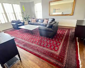BEAUTIFUL RUG AND CHESTS, leather seating, mirror and coffee table are not for sale