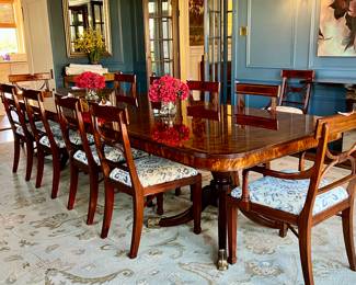 STUNNING CUSTOM MADE DINING TABLE AND 10 CHAIRS...TABLE IS 12' LONG (including two 24" leaves) X 4' WIDE. CHAIRS (1 needs repair) HAVE CUSTOM FABRIC FOR EASY CLEANUP.