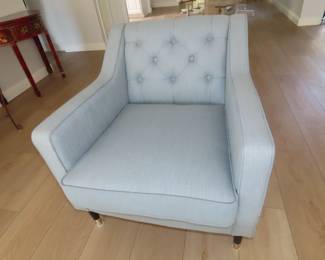 Two matching MCM armchairs.