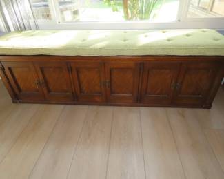 Long bench cabinet.