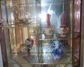 Two mirrored wall/hanging curio cases.