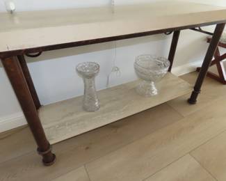 Marble top sofa table with shelf.