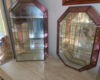 Two mirrored wall/hanging curio cases.