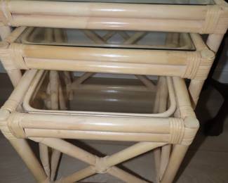 Nesting bamboo/glass tables.