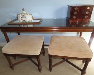 Sofa table with stools.