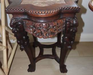Asian themed marble top table/stand.