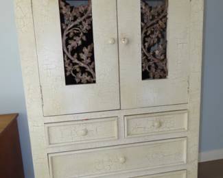 Shabby chic clothing armoire.