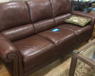 Leather sofa with nailhead trim
