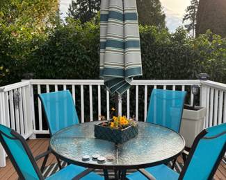 Round Patio Glass Top Dining Table with 4 Blue Sling Chairs
