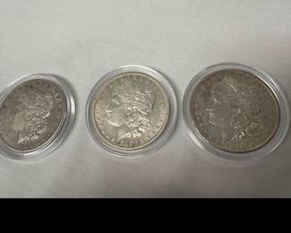 Lot 652 1880, 1900 . 1900 Morgan Silver Dollars