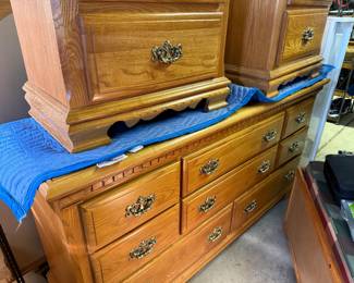 Full size bed frame set: headboard and footboard, two side tables, one six drawer dresser.
