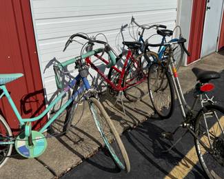 Various vintage bikes. All need your TLC, but MAN! Check out those 80's colors!