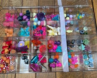 Assortment of resin trinkets, knobs, and buttons